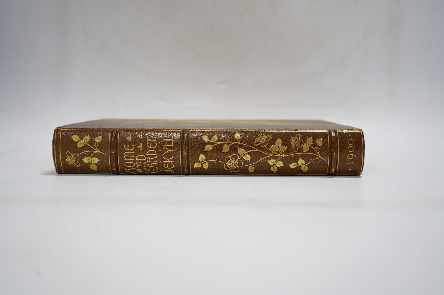 Jekyll, Gertrude - Home and Garden: notes and thoughts, practical and critical, of a worker in both. 1st Edition. title page decoration and 47 photo plates; near contemp. green morocco and marbled boards, panelled spine
